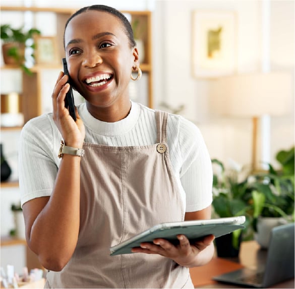 Small business owner working in her plant shop.