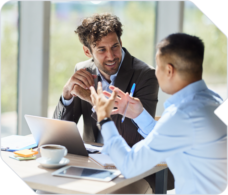 Business owner strategizing with a local BBSI rep to discuss HR, payroll, benefits and operational support