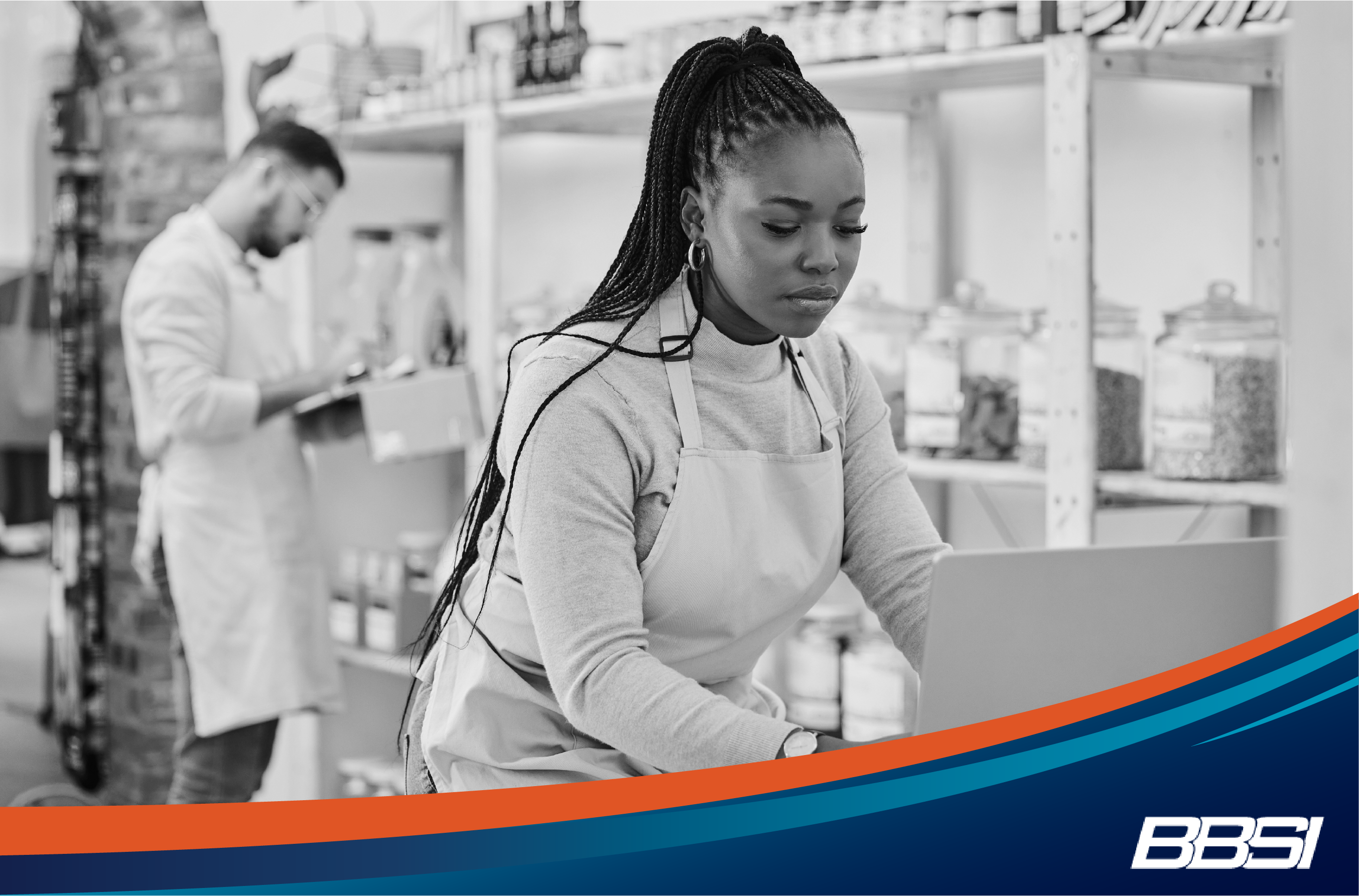 business women working hard to calculate health insurance costs for her small business.