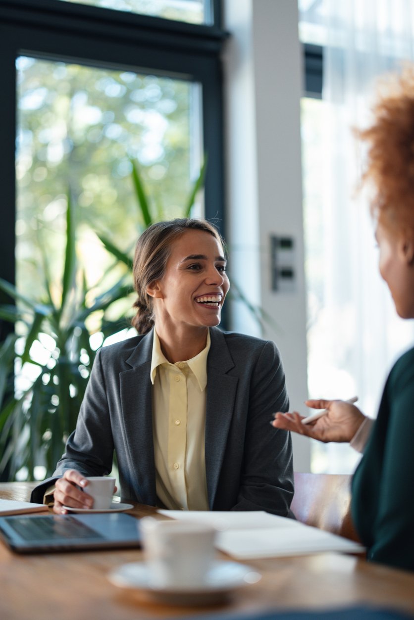 Business women discussing payroll and HR