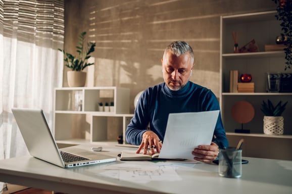 middle-aged-man-working-in-a-home-office