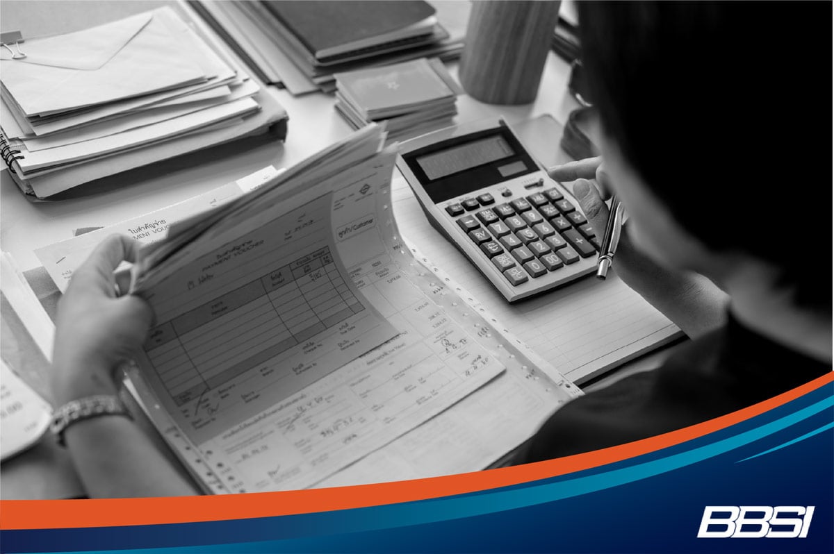 A business owner struggling with a manual payroll system