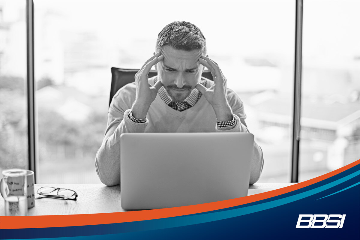 Stressed business owner working on payroll