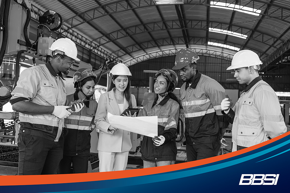 a group of factory employees working in a safety culture