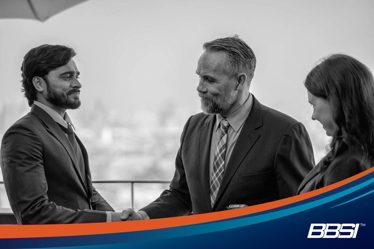 Business owner meeting with his new hire