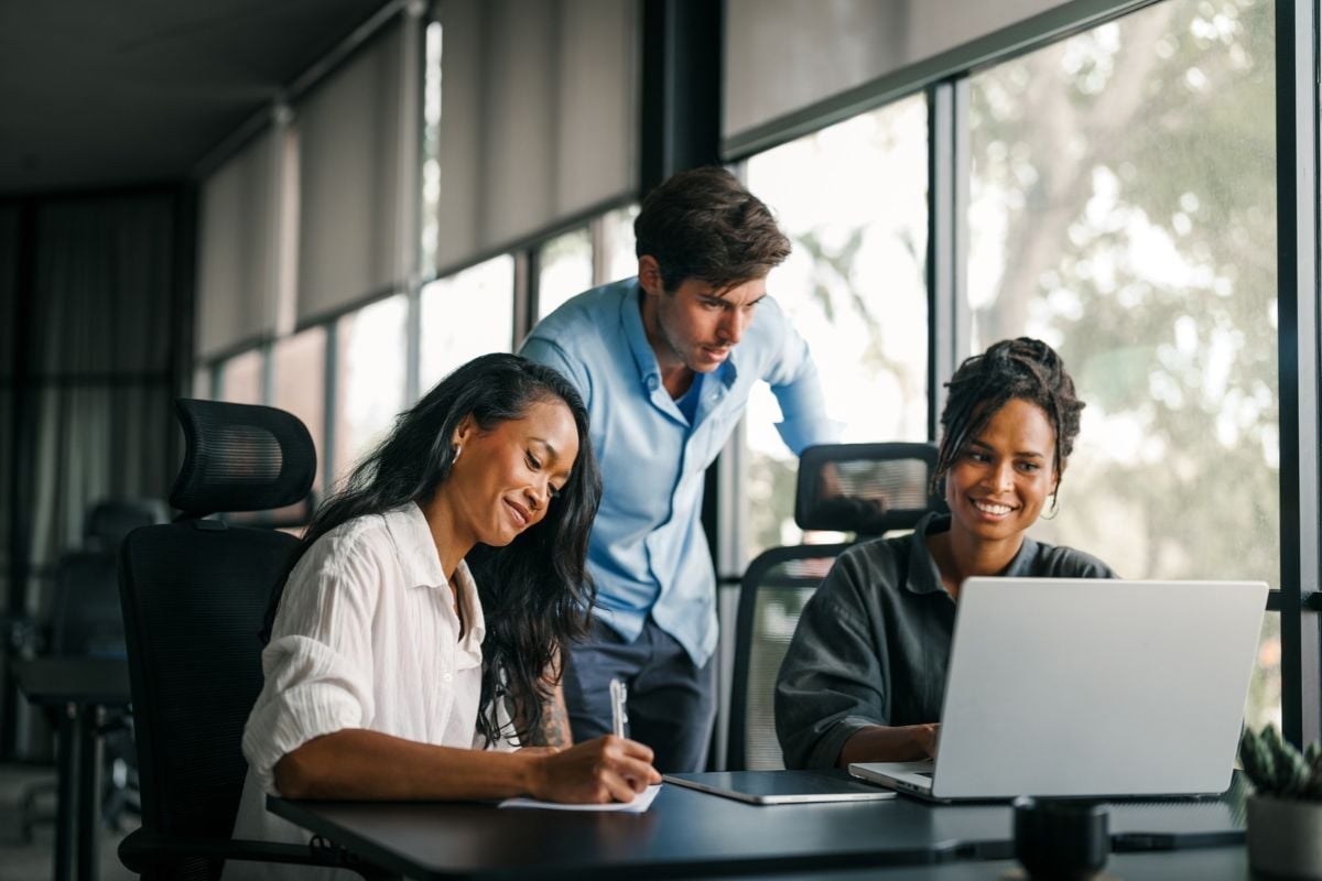 HR professionals reviewing employee benefits and health plan options