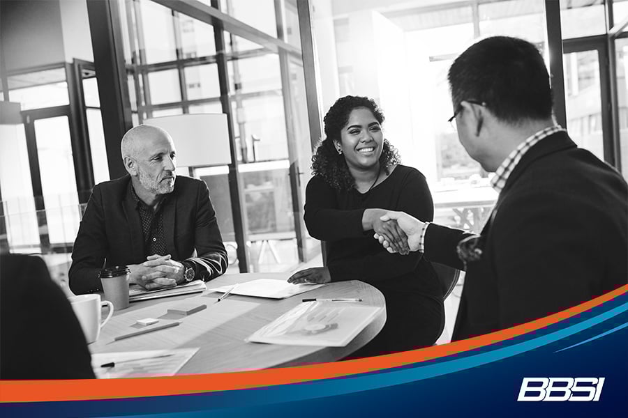 Business owner partnering with a PEO for Employee Benefit Insurance
