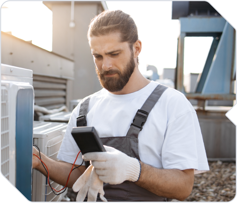 HVAC and plumbing worker exploring solutions