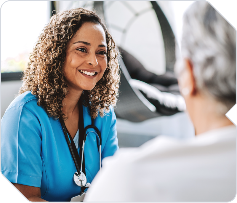A home healthcare employee taking care of a patient.