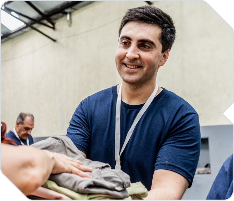 Man assisting others as a Non‑Profit business owner