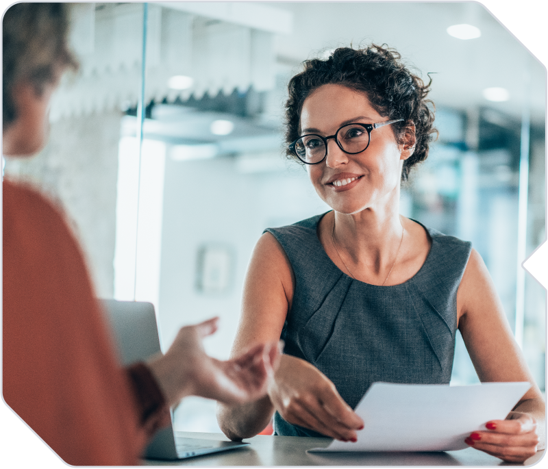 A recruiter interviewing a candidate.