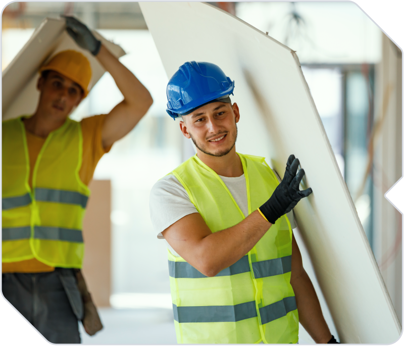 Restoration workers managing workforce risk and compliance with PPE gear