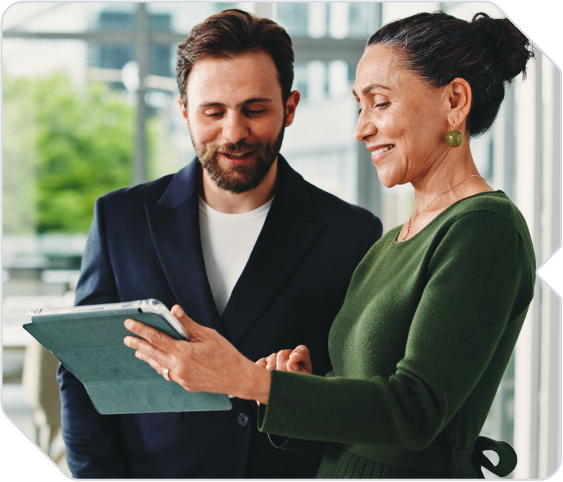 A recruiter discussing staffing strategy with a business owner.