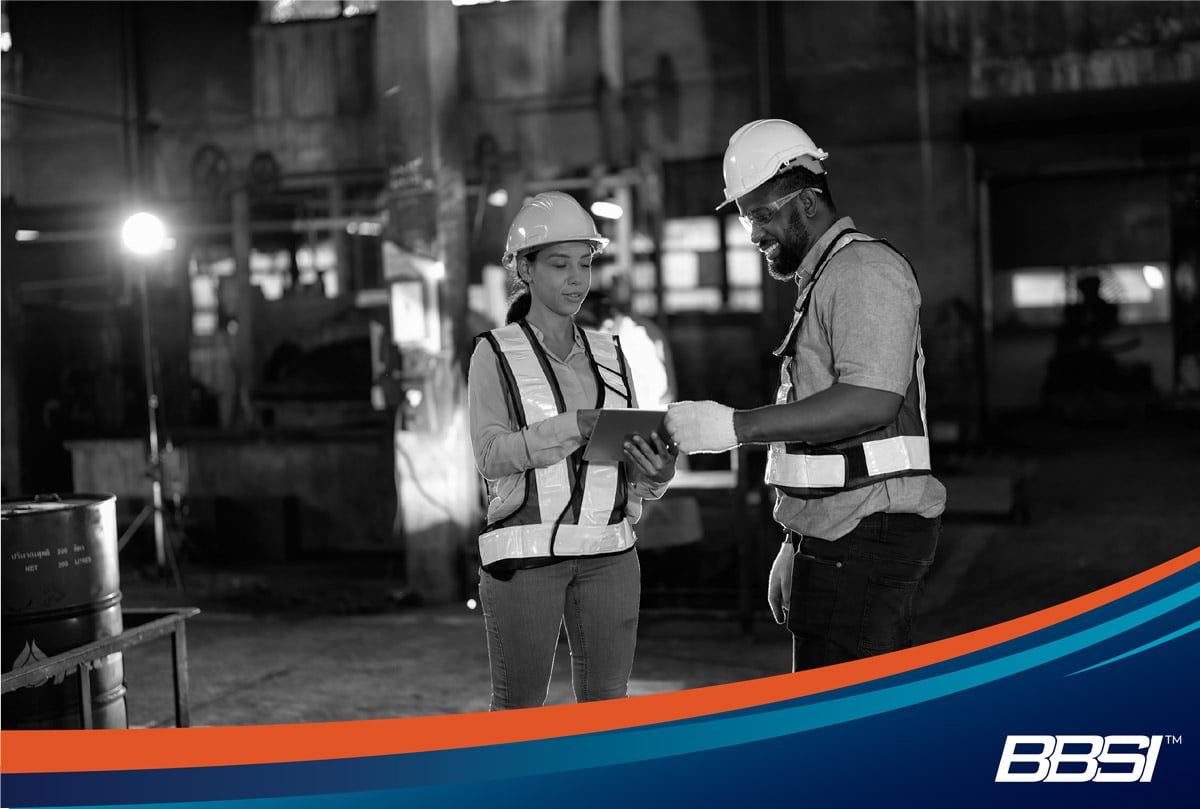 Workers tracking their overtime with timekeeping software