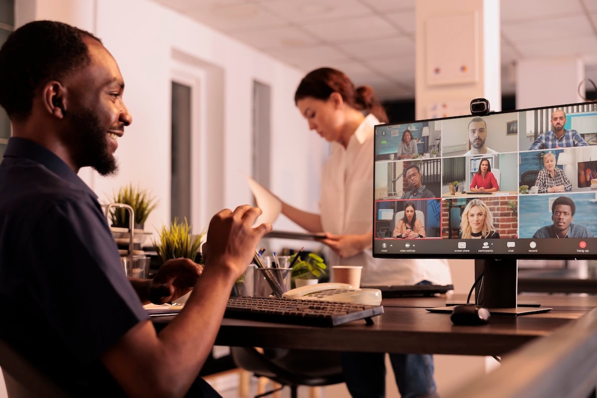 Professional worker on a video call with multiple state employees